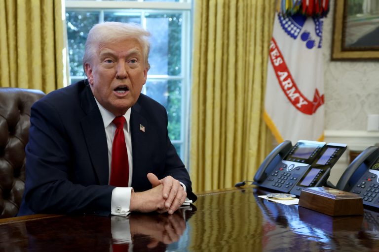 U.S. President Donald Trump speaks to the media in the Oval Office at the White House in Washington